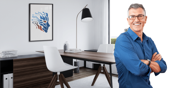 A man in a blue shirt stands in front of a desk, appearing engaged and ready for a discussion or task, behind him Hisabatk logo in black frame.